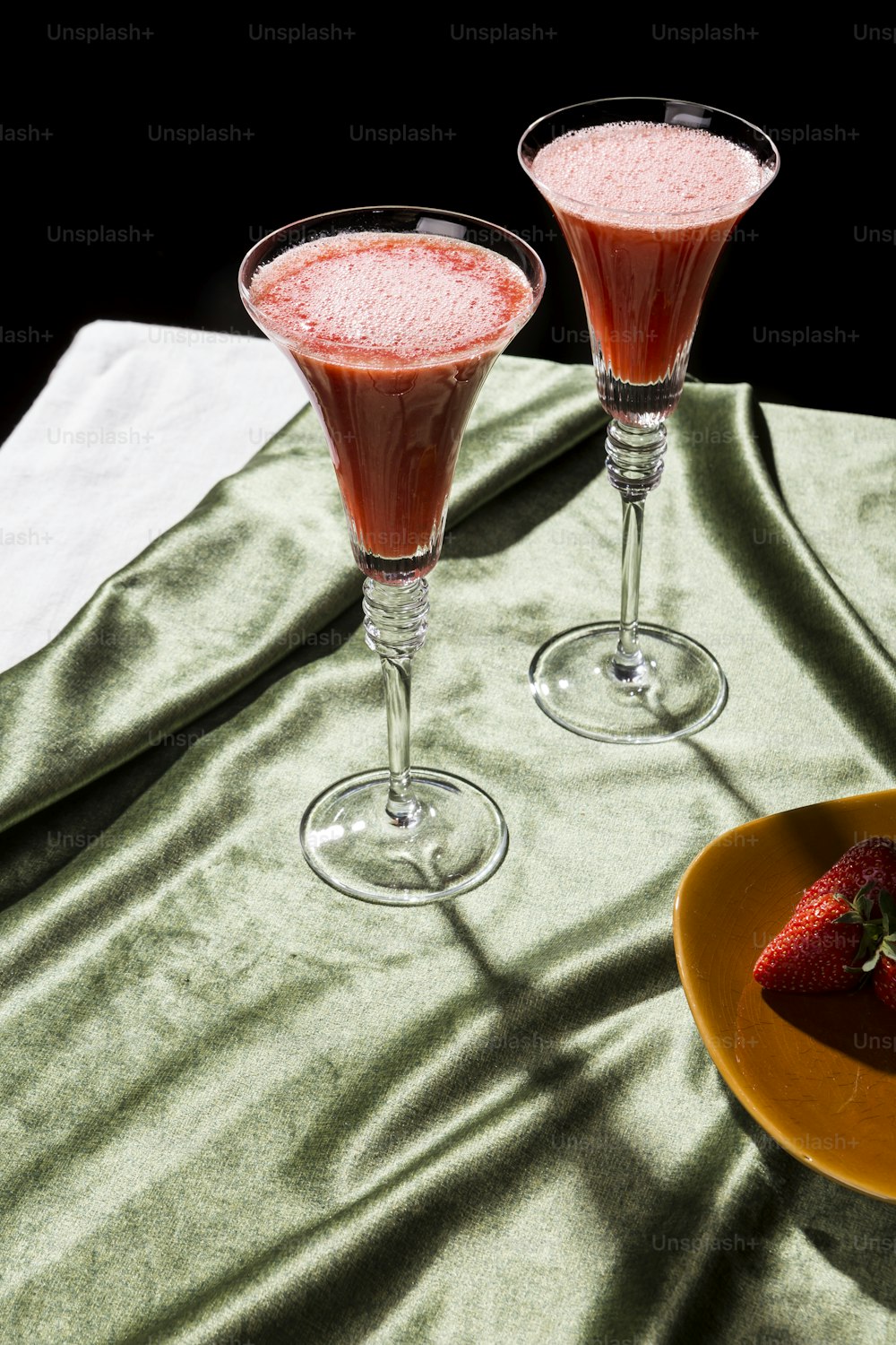 Rossini is a cocktail made with Prosecco or Champagne and strawberry puree; pop contemporary style photography