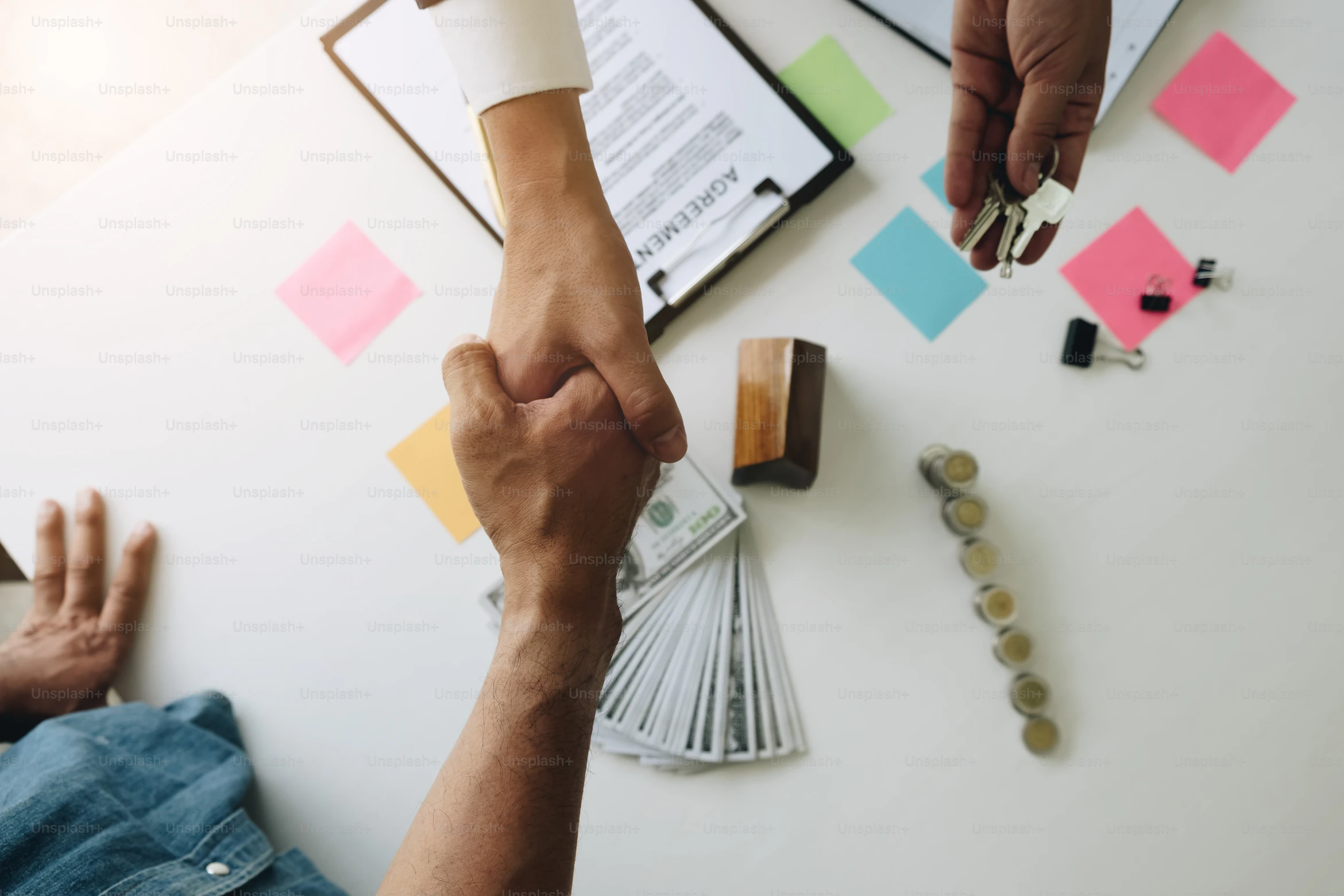 Personal loan agreement and financial paperwork on a desk