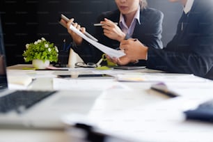 Business Concept, Audit team working with tablet computer and paper report in finance office.