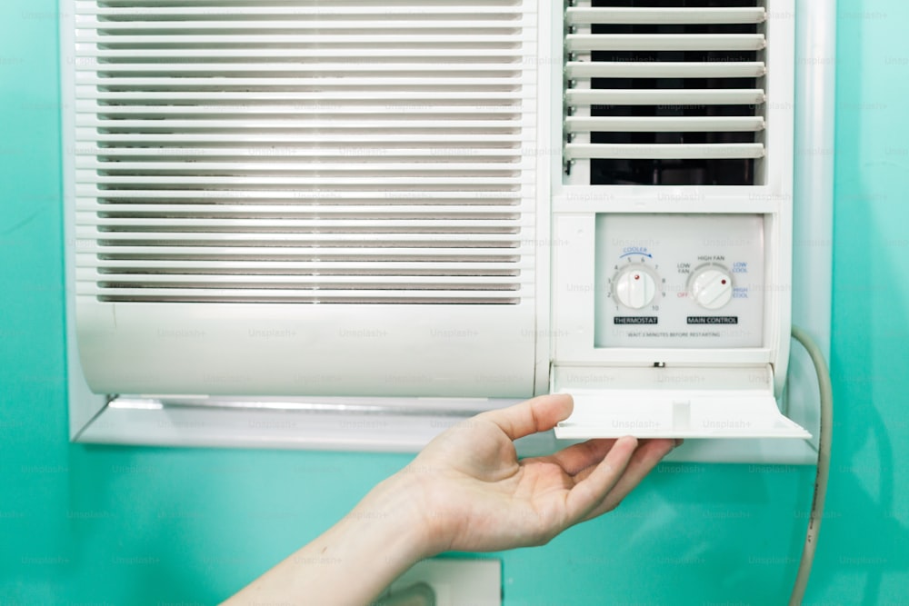 Open panel adjustment of a small room air conditioner