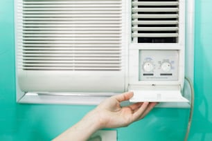 Open panel adjustment of a small room air conditioner