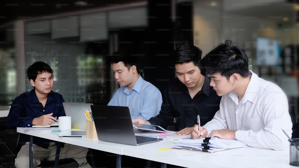 Young Business meeting on office table.