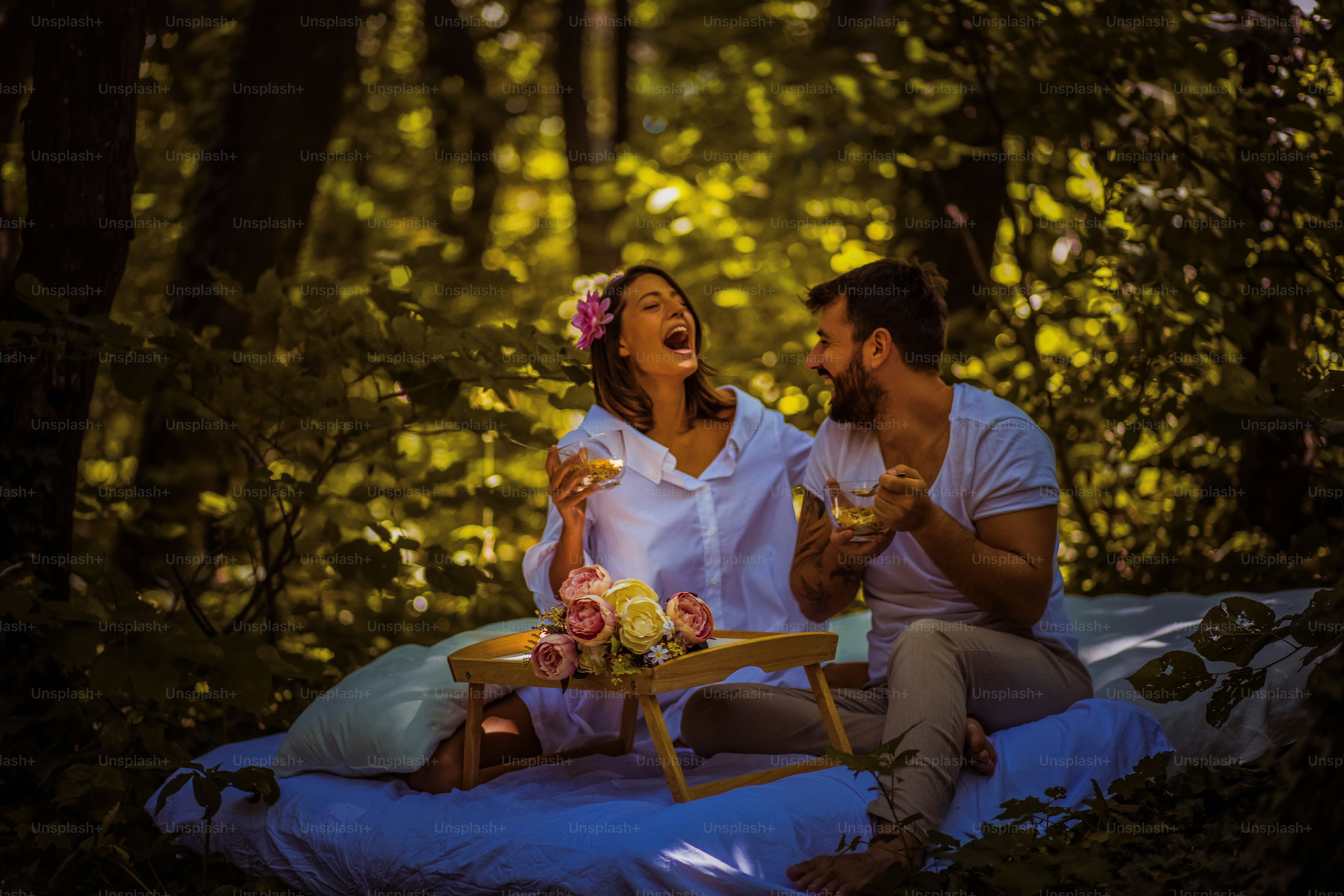 Morning like this. Couple in nature have breakfast together.