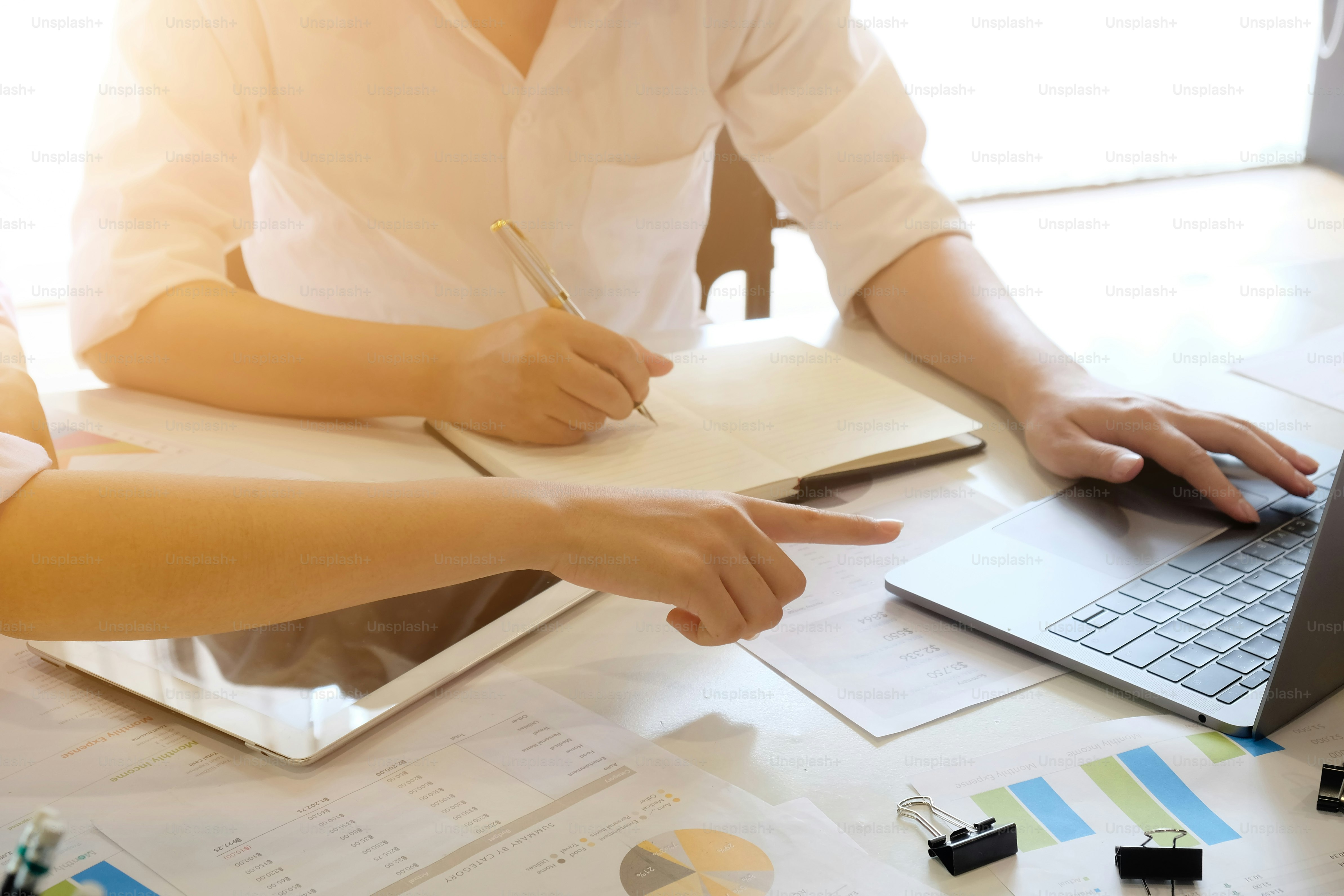 Worker reading Gujarati safety and HR instructions on shop floor