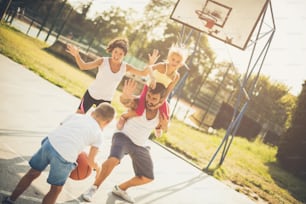 Do not let others win. Family playing basketball.