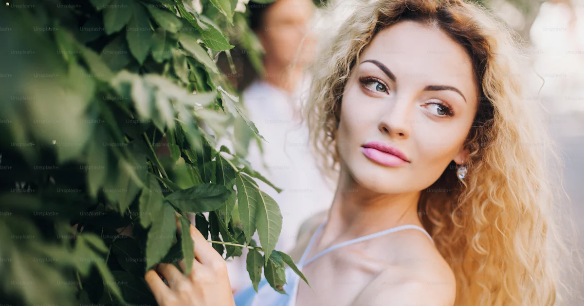 Beautiful happy couple in love posing, woman portrait in sunlight in ...
