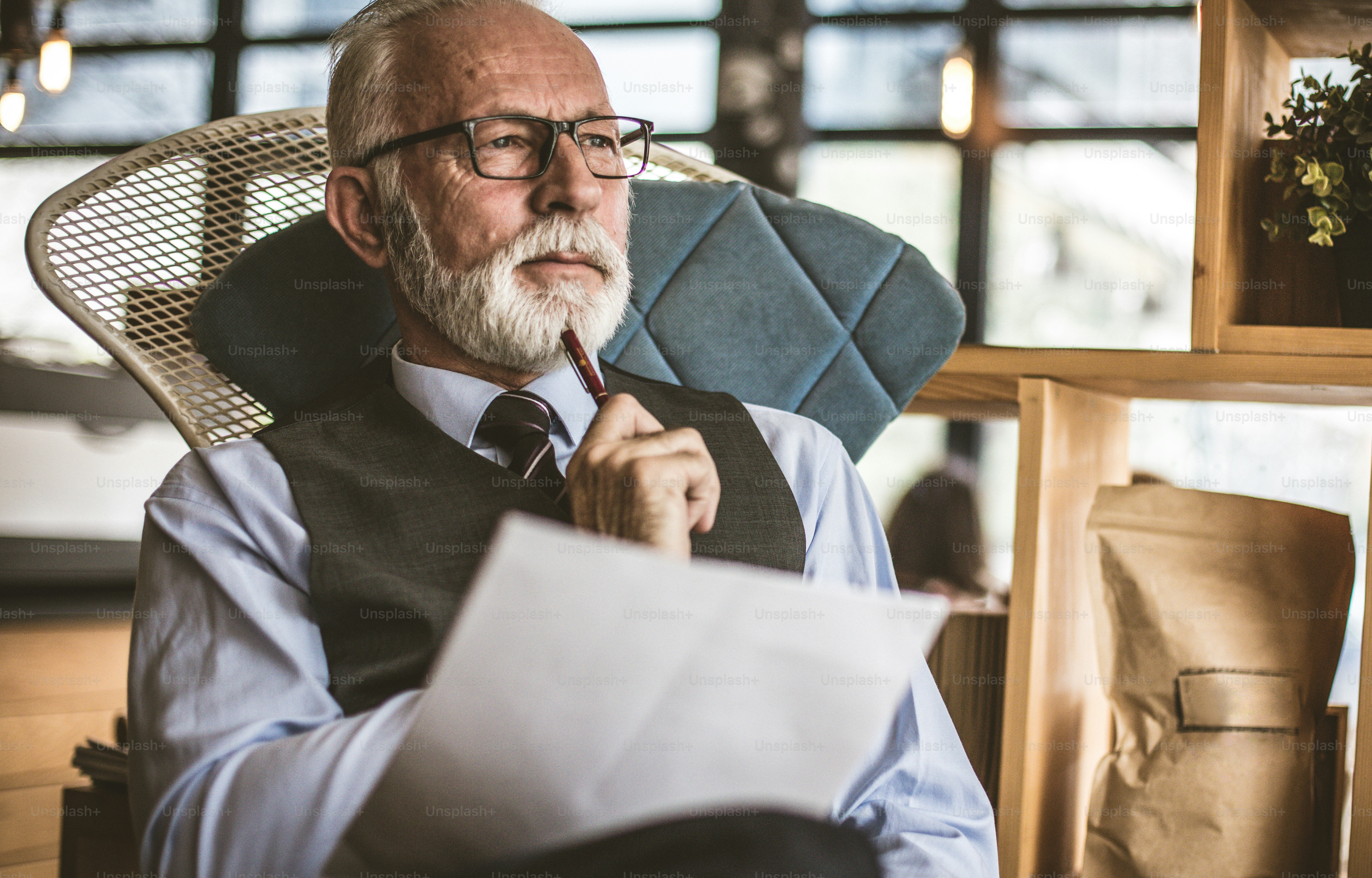 Think about it is good for you and your business. Business man holding document. Close up.