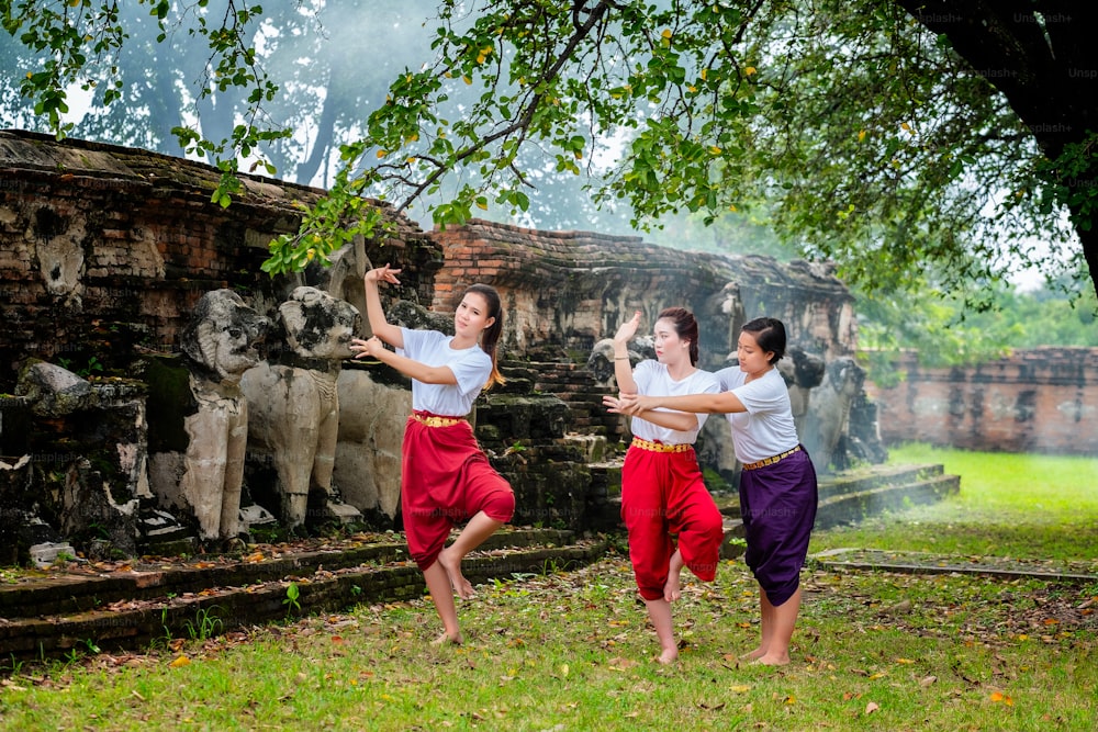 Teacher training two beautiful girls dance Thai Thai Khon show is a major art form of Thailand. Learn Thai Dance for Young People