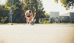 Dad, this is a real fun. Father and son playing on playground.