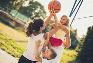 It's time to win. Family playing basketball.