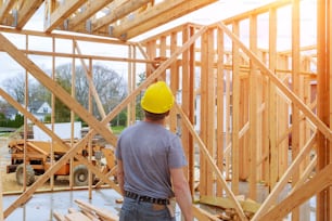 Building Inspector Looking At New Property new home construction