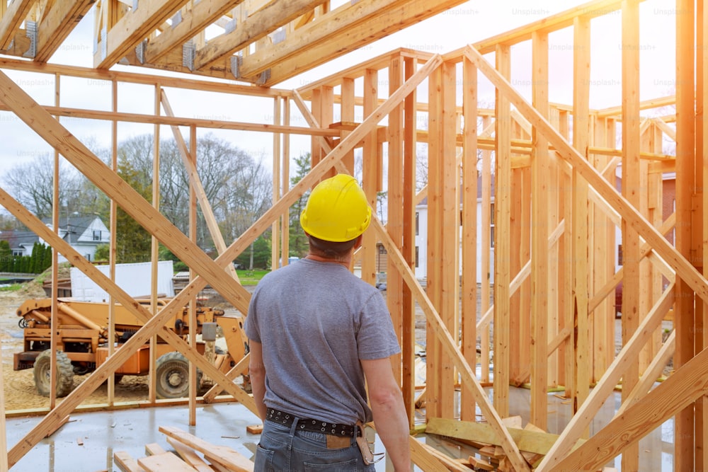 Building Inspector Looking At New Property new home construction