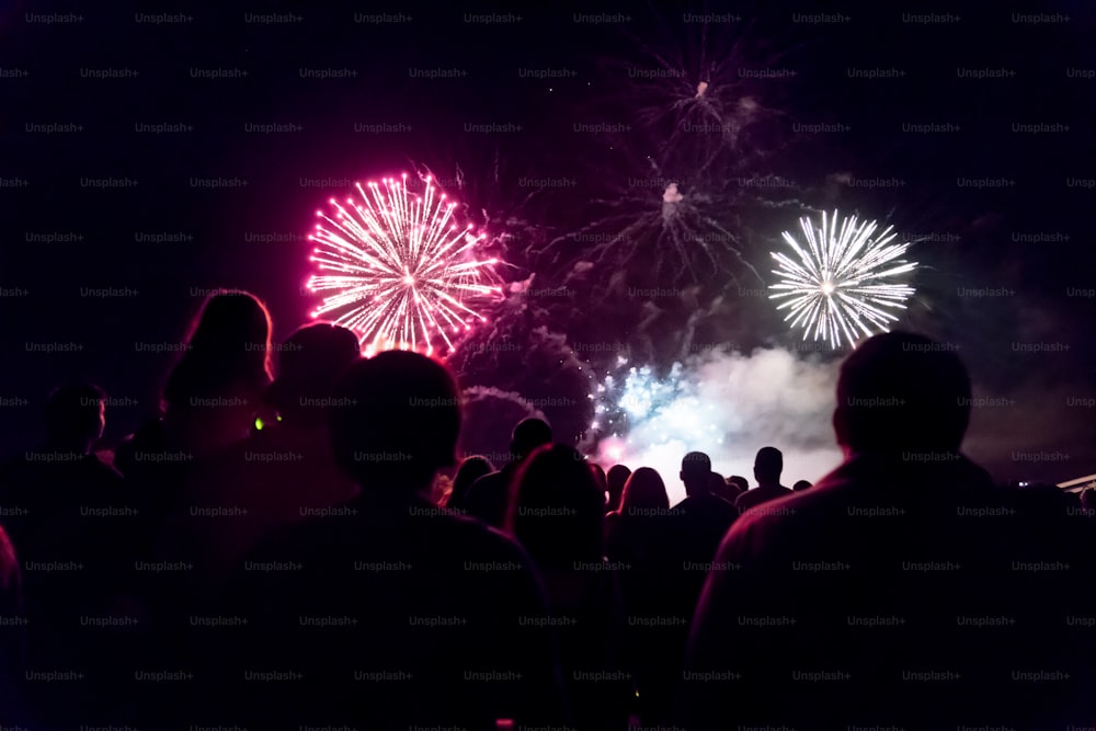 Crowd watching fireworks and celebrating new year