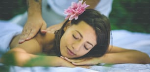 Feeling of peace and relaxation just for her. Luxury spa treatment at nature.  Young women. Close up.
