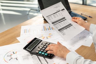 Cropped photo of secretary hands accounting advisor employee employer employment entrepreneur lady in her formalwear shirt she sit behind desk in light loft interior check cost tax