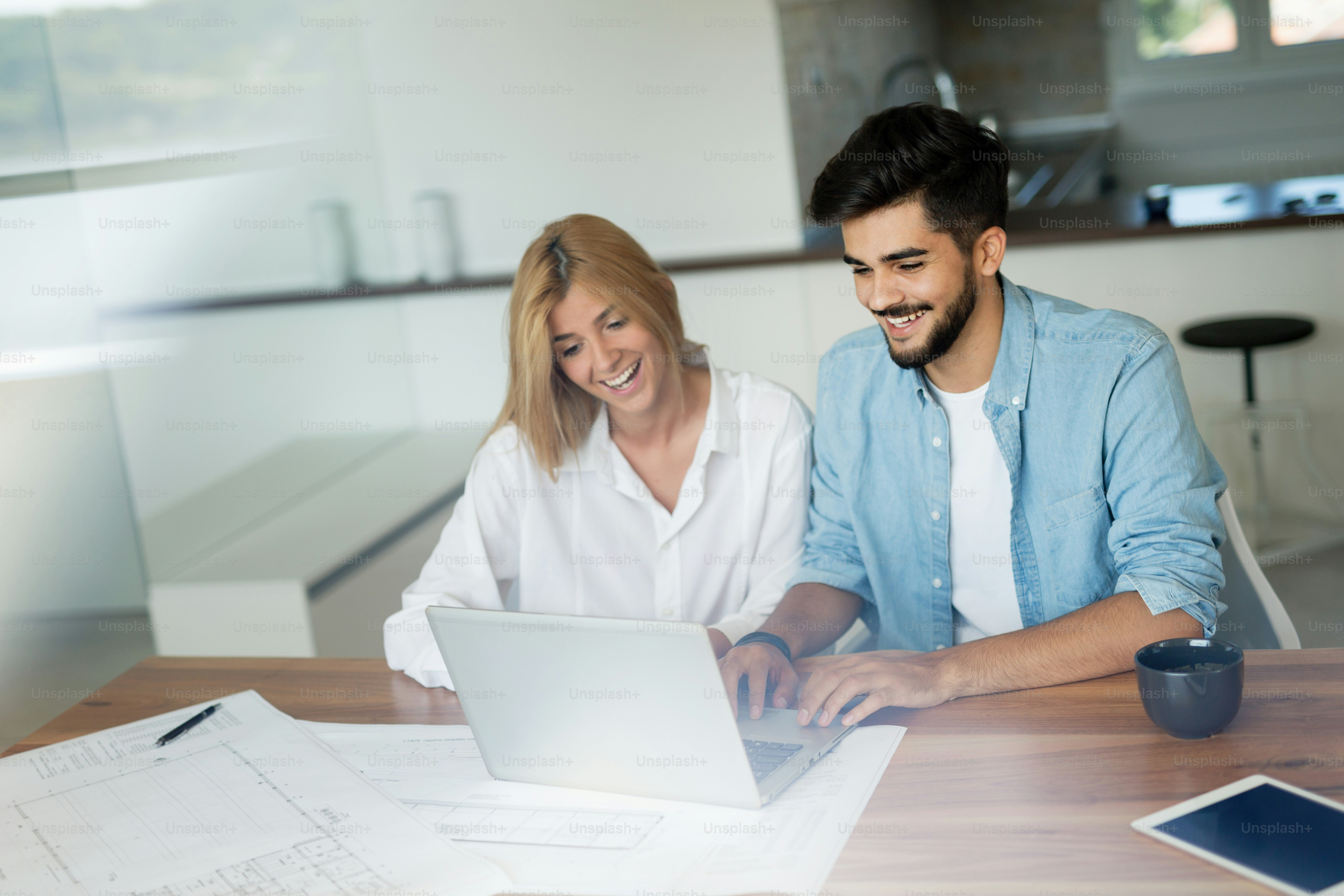 Business People and architects working on project together in office