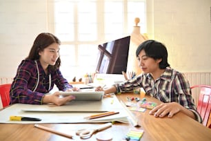 Meeting of Designer working with digital tablet design  a fashion on workplace.