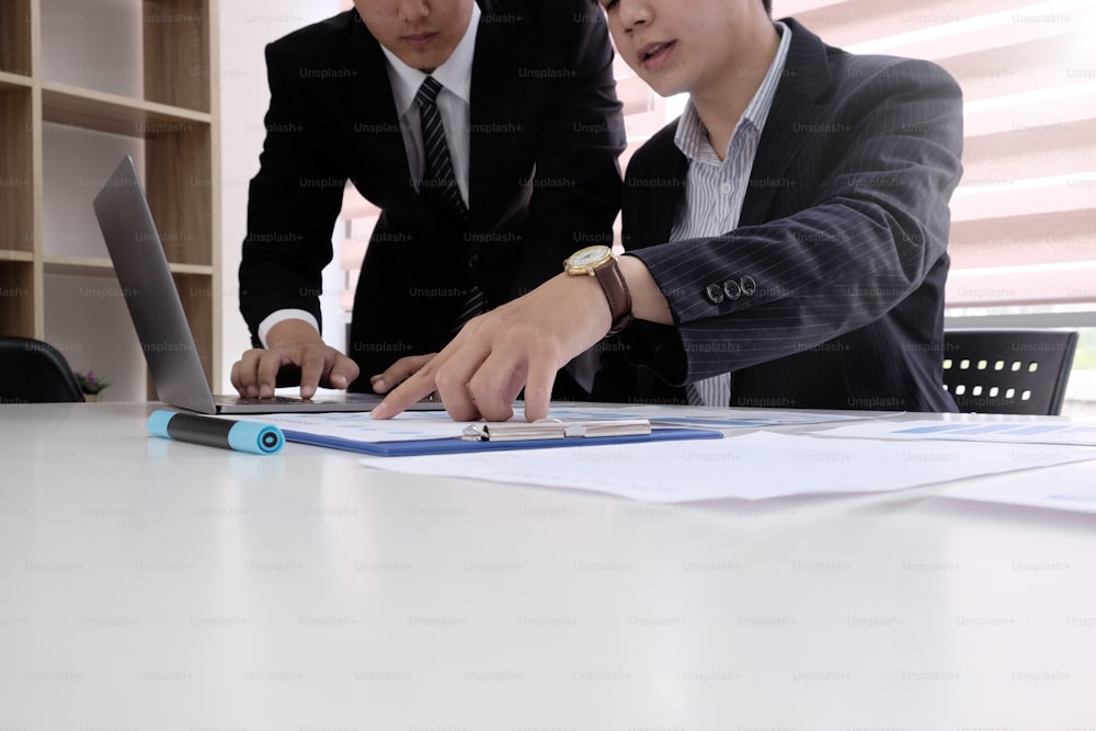 Business project team working together at meeting room at office Mature businessman discuss information with a younger colleague.