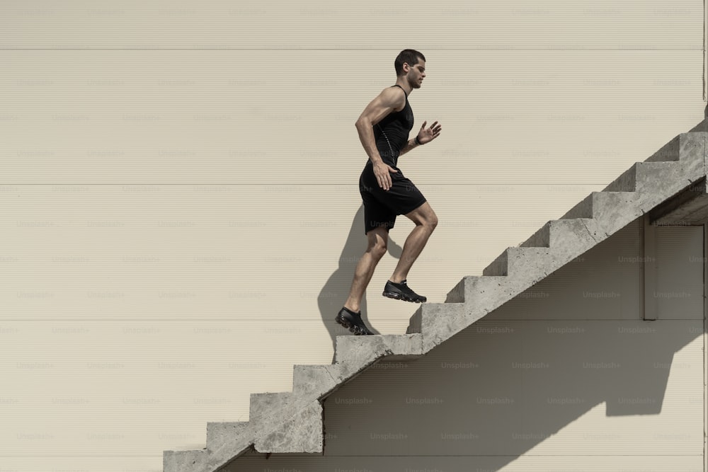 Ambitions concept with sportsman climbing stairs, running.