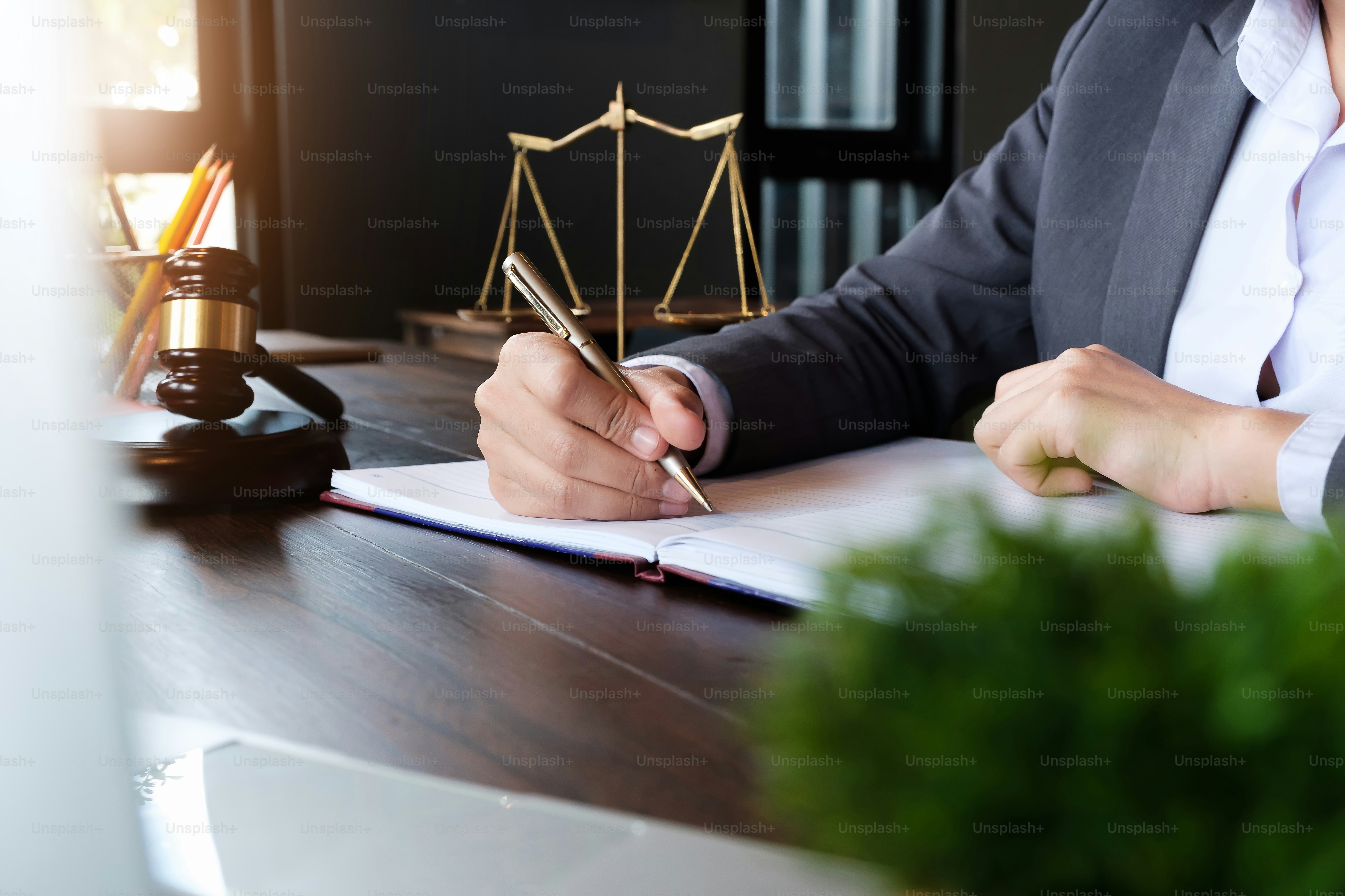 Judge gavel with Justice lawyers, Business woman in suit or lawyer working on a documents. Legal law, advice and justice concept.