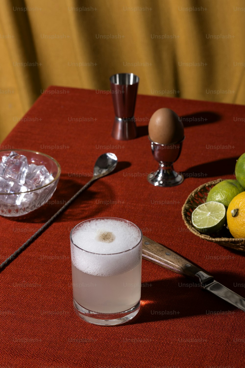 A glass of pisco sour cocktail