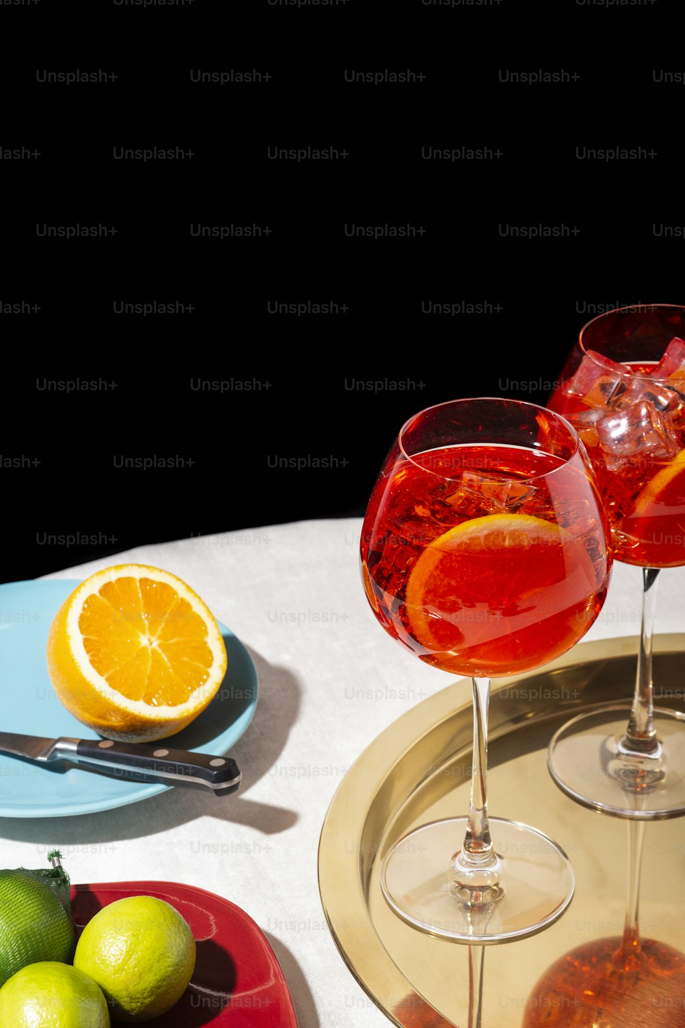 Spritz veneziano, an IBA cocktail with Prosecco or white sparkling wine, bitter, soda, ice and a slice of orange, in a calix on a table, pop graphic style
