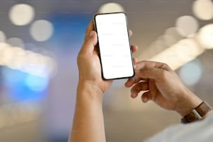 Man using smart phone and blurred bokeh background
