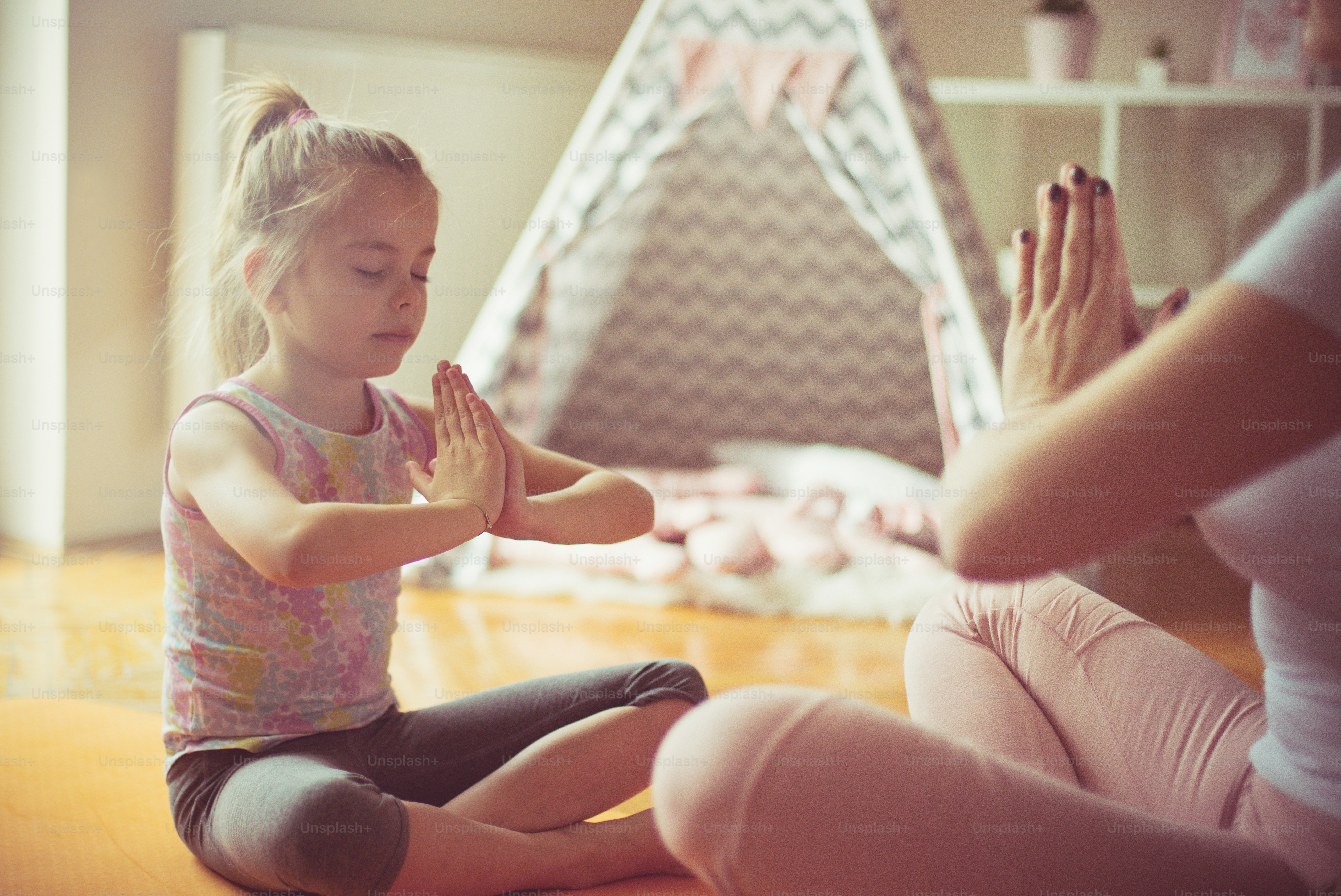 Release all your tension. Mother and daughter working exercise.