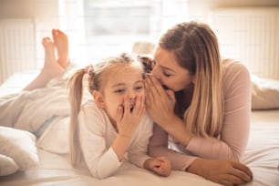 Do you know that you are my princess. Mother and daughter in bed.