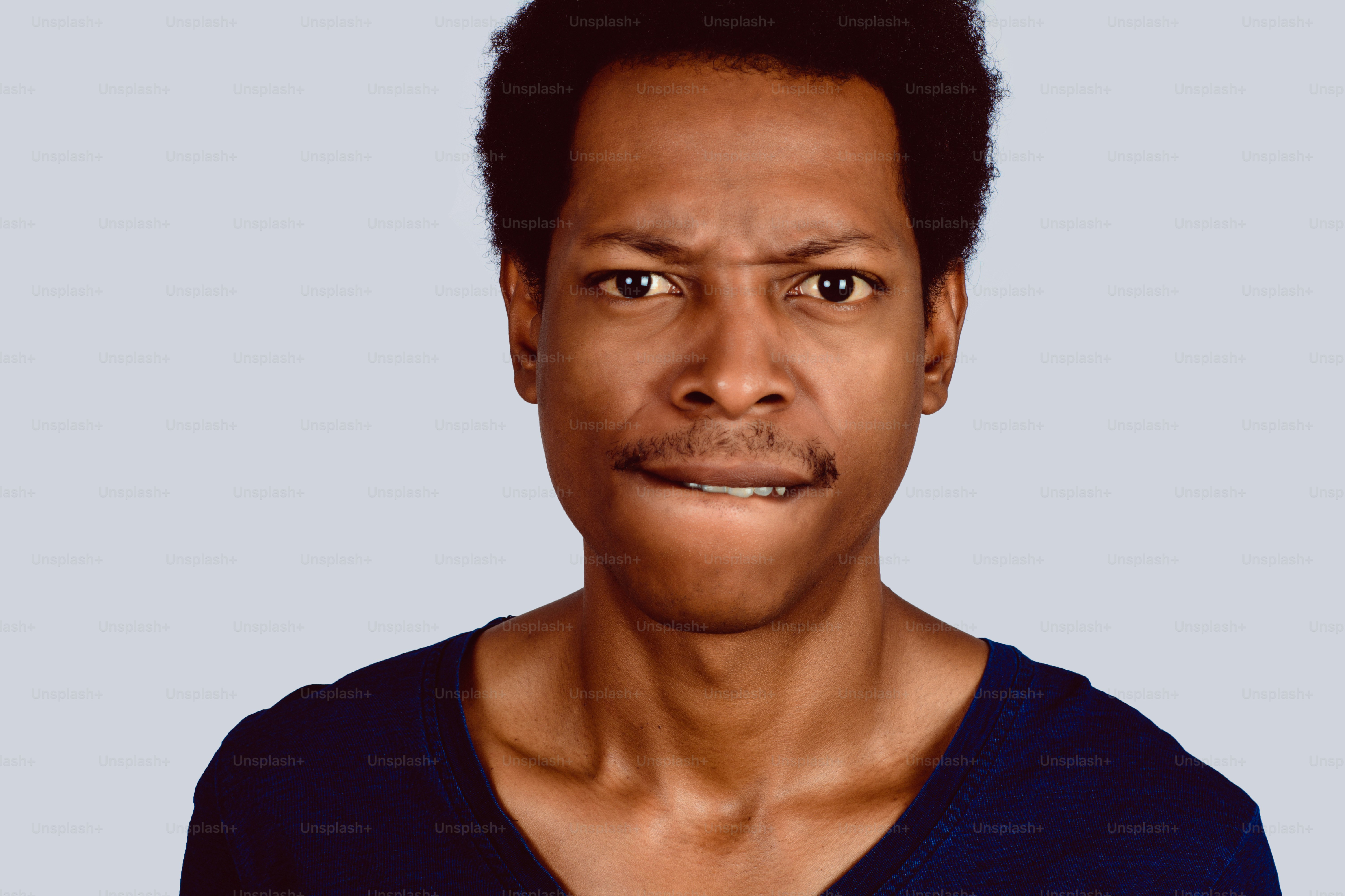 Portrait of Afro American man looking worried about something.