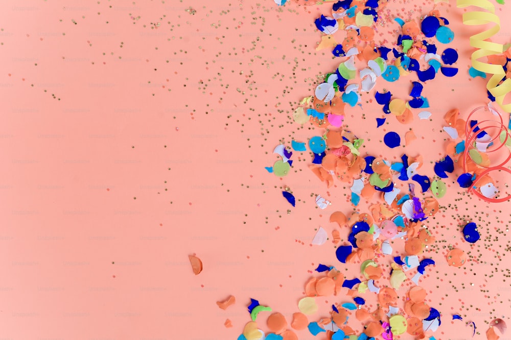 Top view of colorful party confetti background. Celebration concept