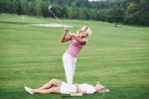 Two women decides to play the golf a little bit another way. Try this is at your own risk.