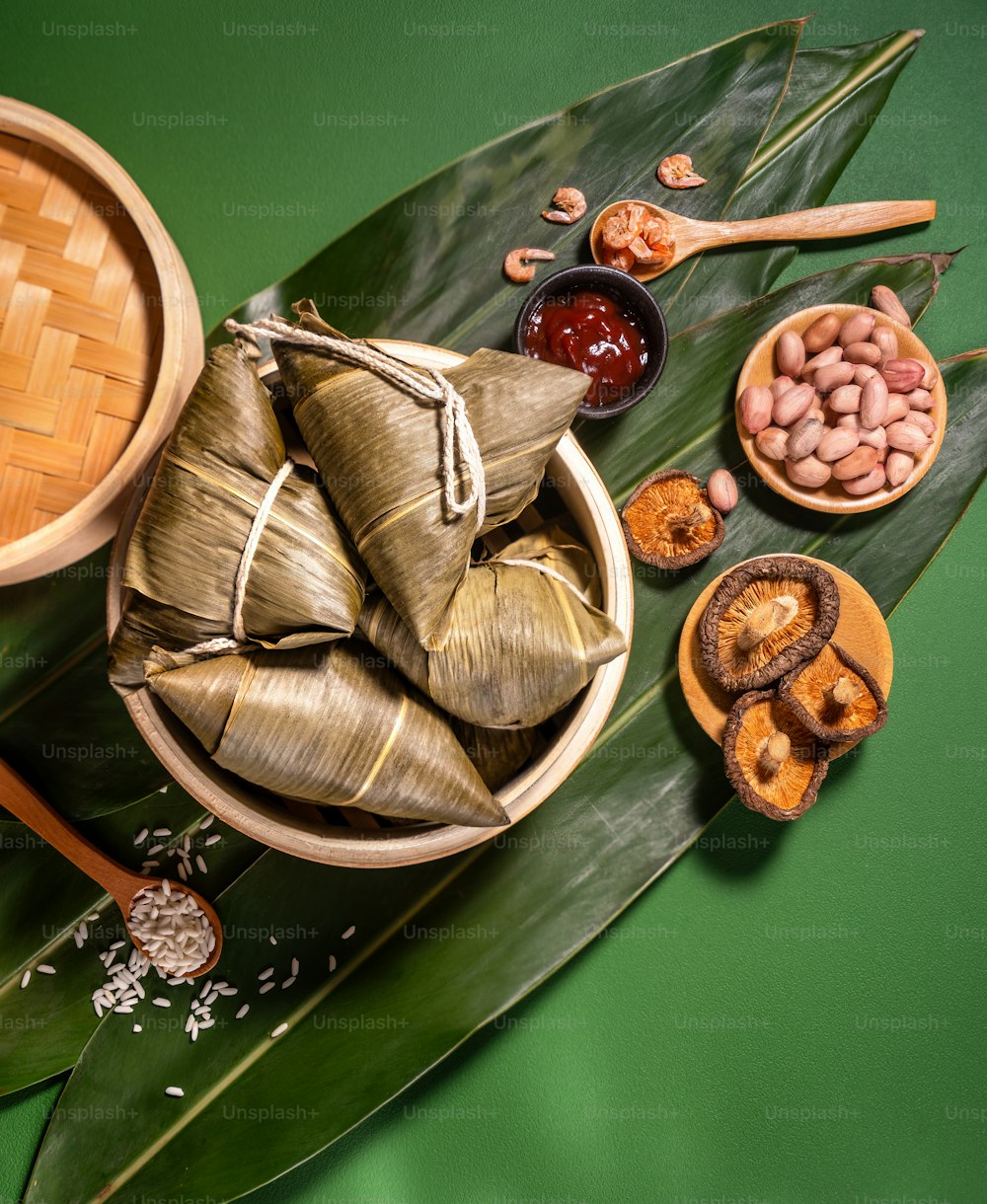 Close up, copy space, top view, flat lay. Famous asian chinese tasty handmade food in duan wu festival, steamed rice dumplings shaped like pyramidal ingredients