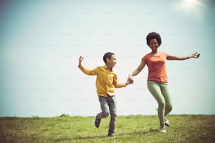 Feel the freedom. Mother and son in the park.