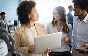 Successful happy business group of people at work in office