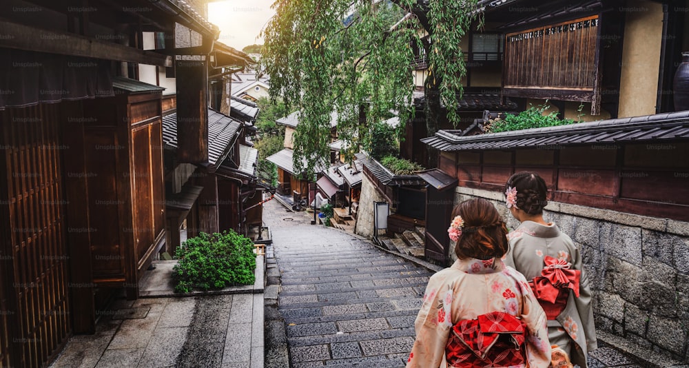 Kyoto, Japan Culture Travel - Asian traveler wearing traditional Japanese kimono walking in Higashiyama district in the old town of Kyoto, Japan.