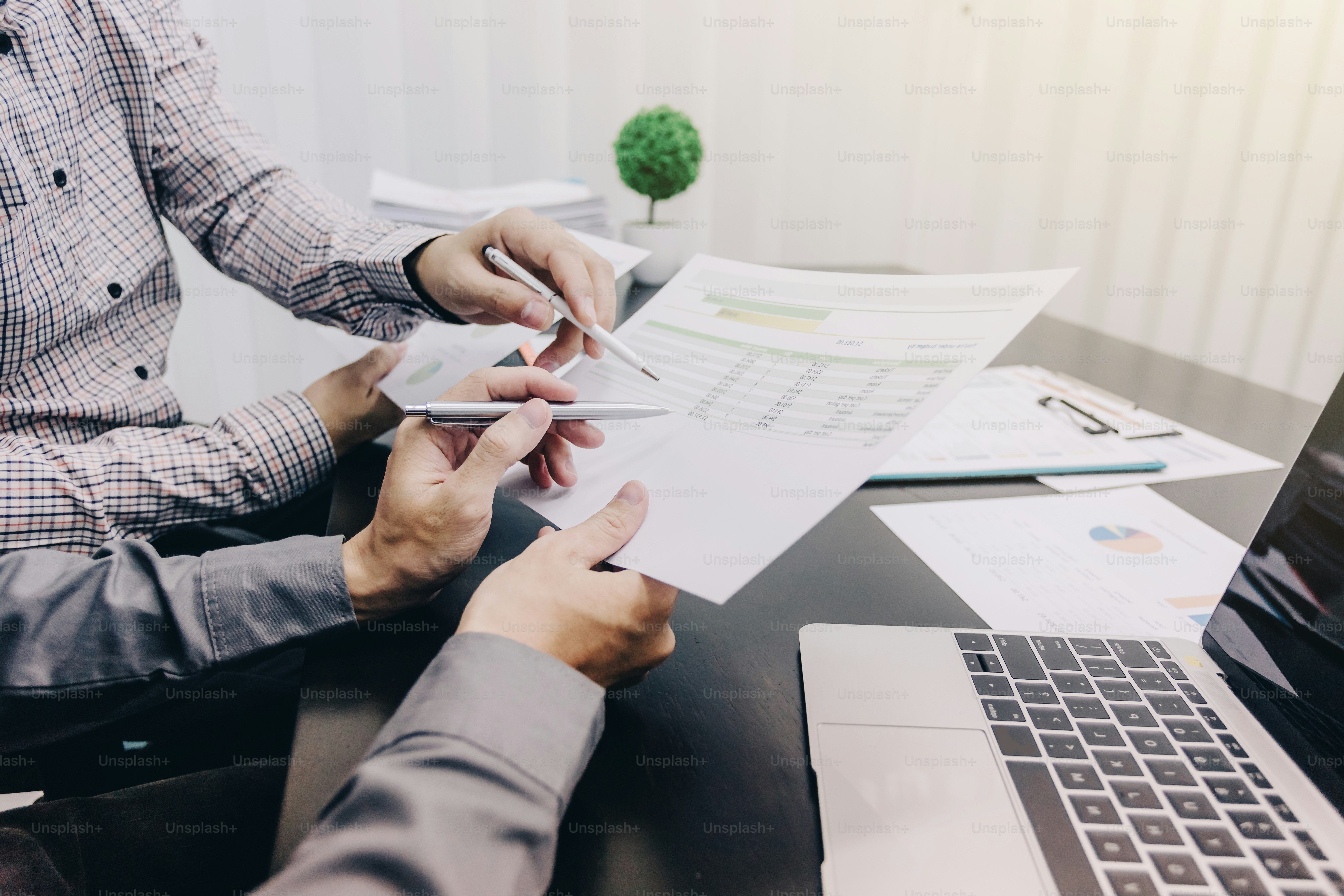 Business people to comment on investment and marketing plan in the meeting.