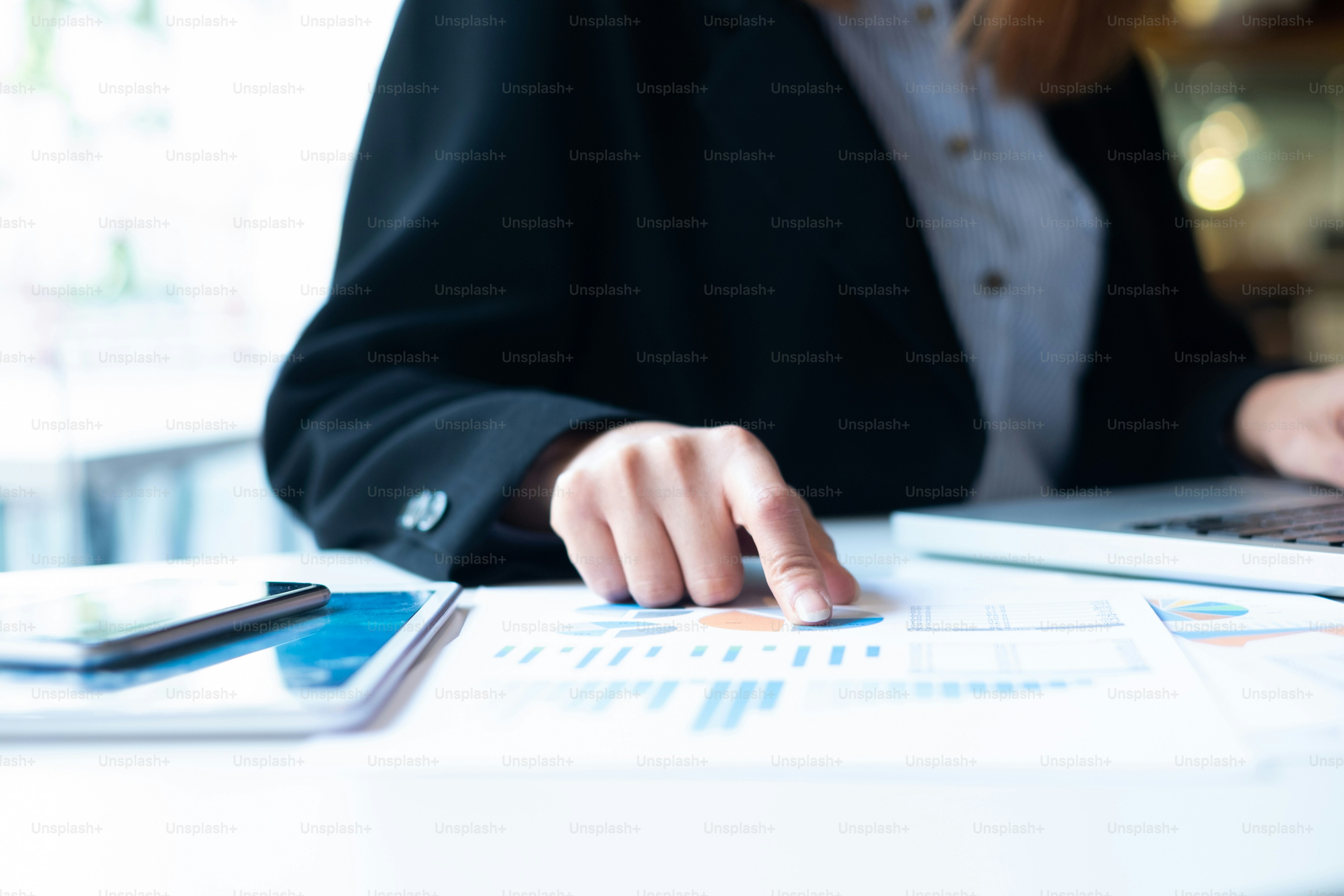 Businessman planning and analyse investment marketing data.