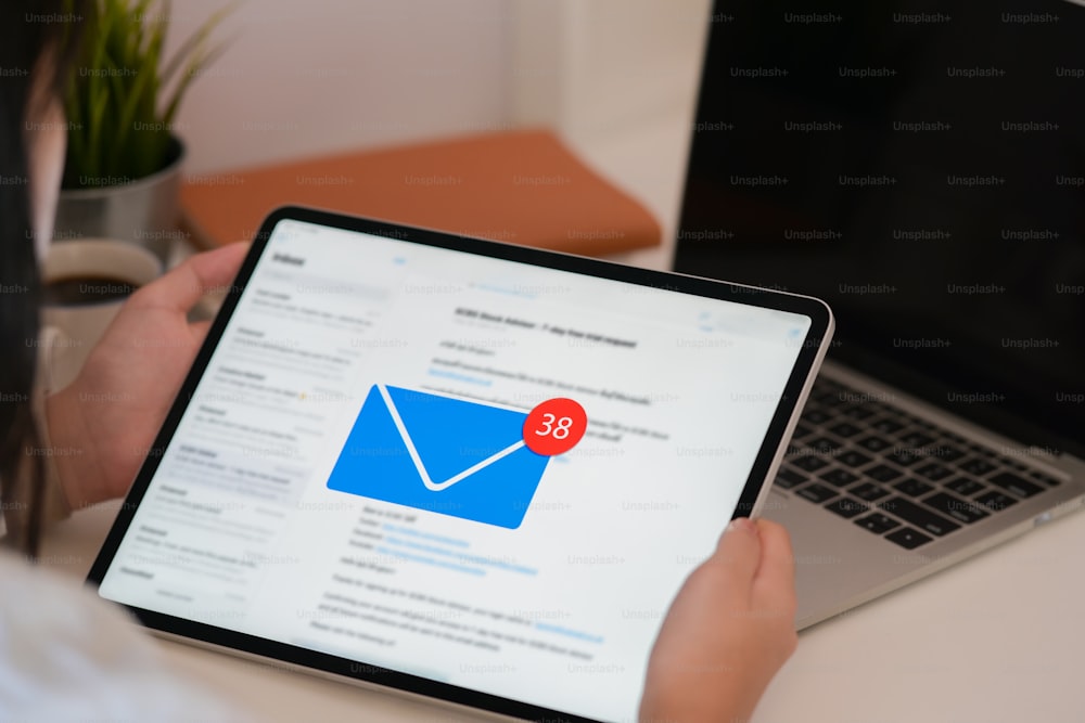 Businesswoman reading e-mail box from modern tablet