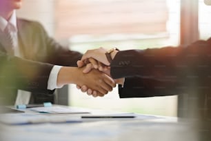 Businessmen handshaking.acquisition concept.