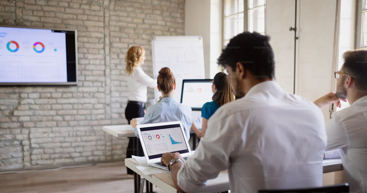 Successful happy group of students learning software engineering and ...