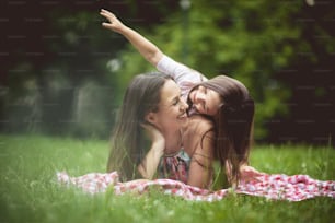 We always find time to play. Mother and daughter in nature.
