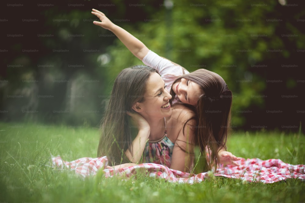 We always find time to play. Mother and daughter in nature.