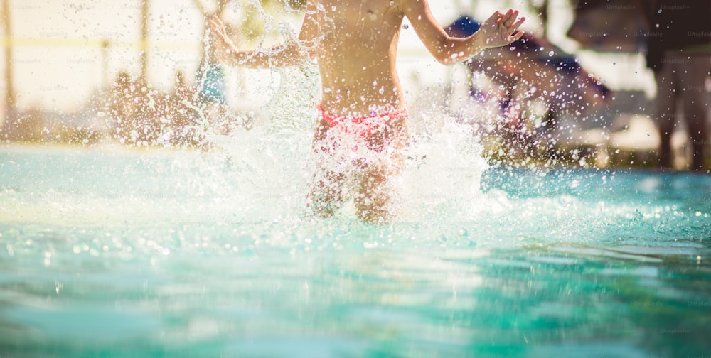 girl wearing black swimsuit Was swimming in the pool. in the concept of  hobbies, summer, leisure activities, children swimming. soft and selective  focus. 17644129 Stock Photo at Vecteezy