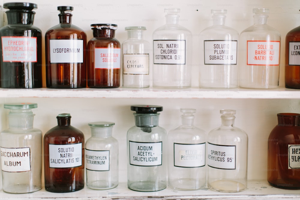 Bottles on the shelf in old pharmacy.