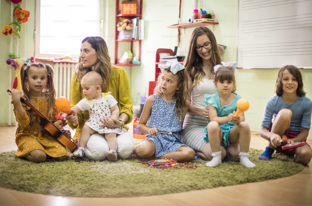 They have the makings of a successful band. Children in music school.