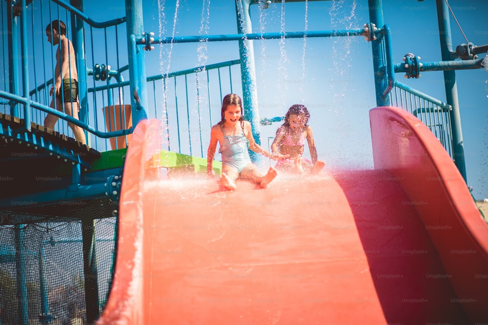 Toboggan is so fun. Children having fun on toboggan.