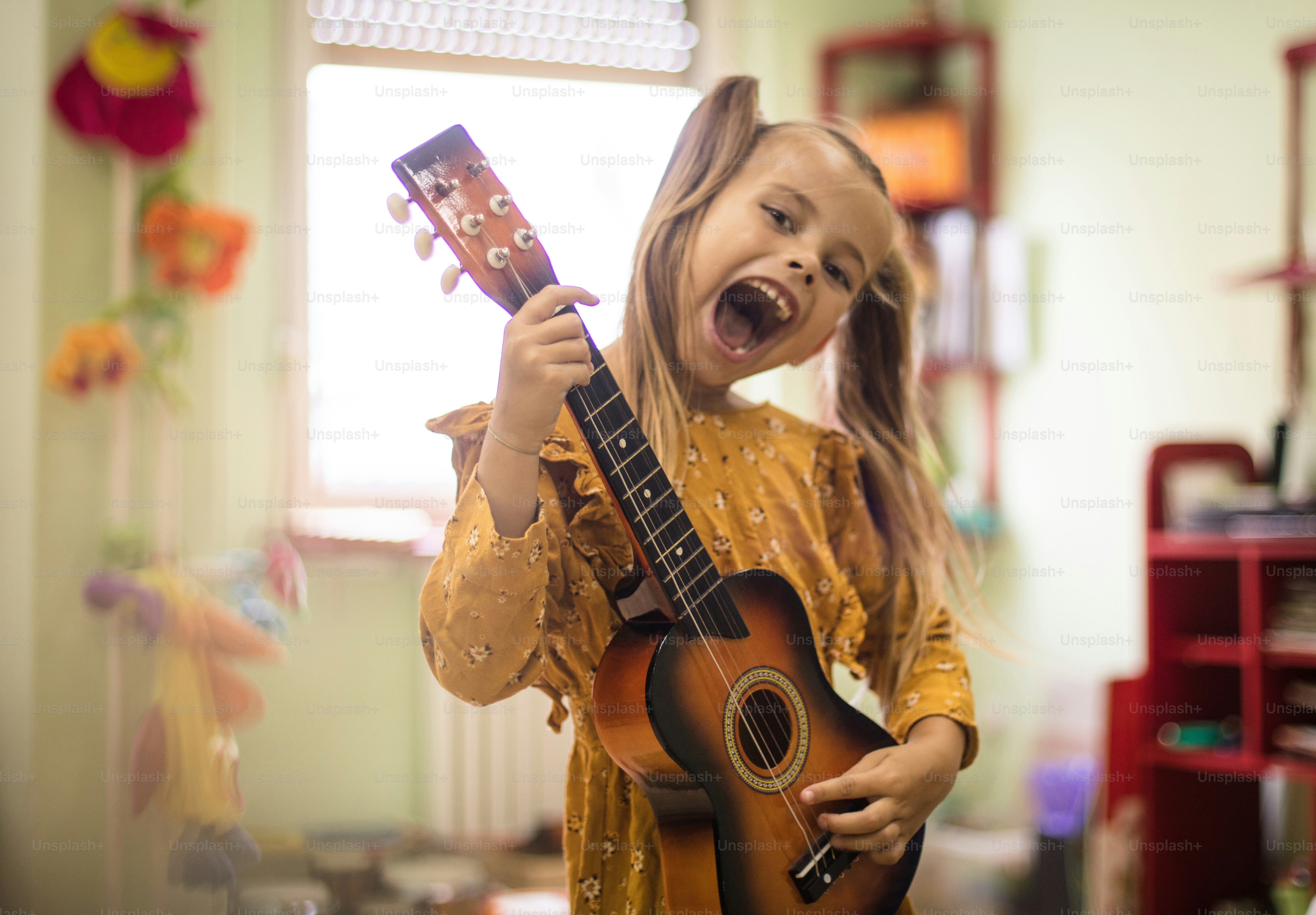 Releasing her inner muse. Child in music school. photo – Portrait Image ...