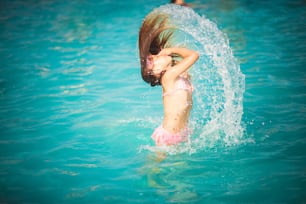 Feel the freedom of the summer. Child in the pool.