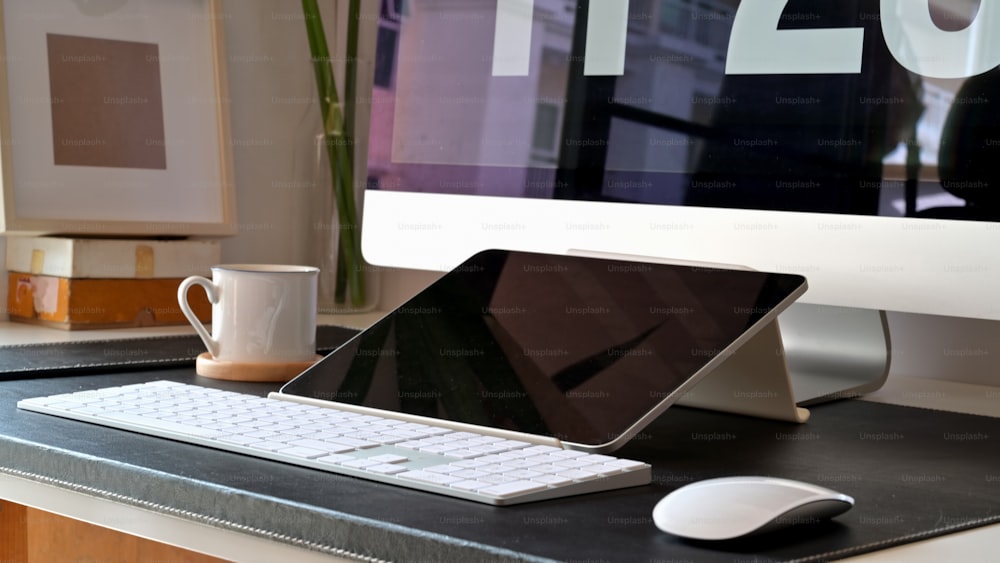 Loft workspace minimal desktop with  mockup desktop computer and tablet.